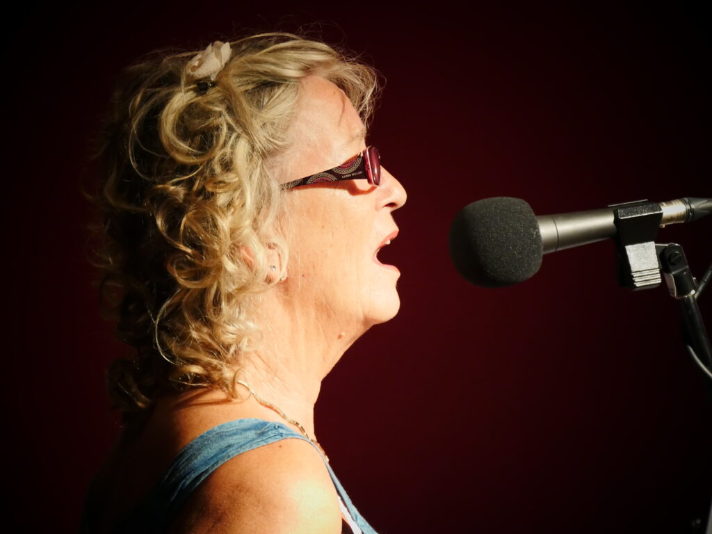 female singing with microphone